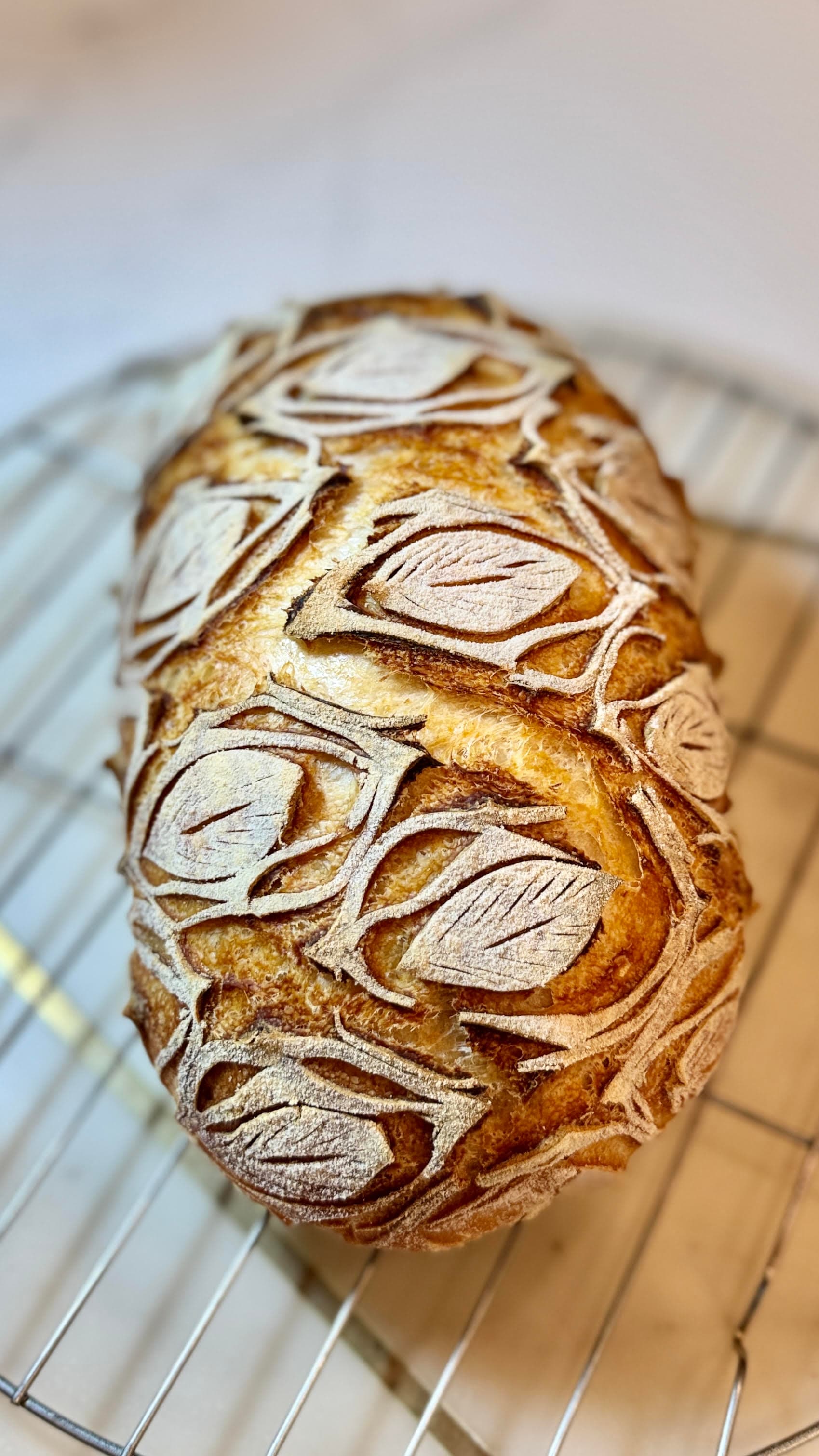 Decorative scored sourdough loaf